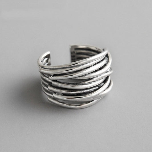 Anillo ajustable plateado en capas
