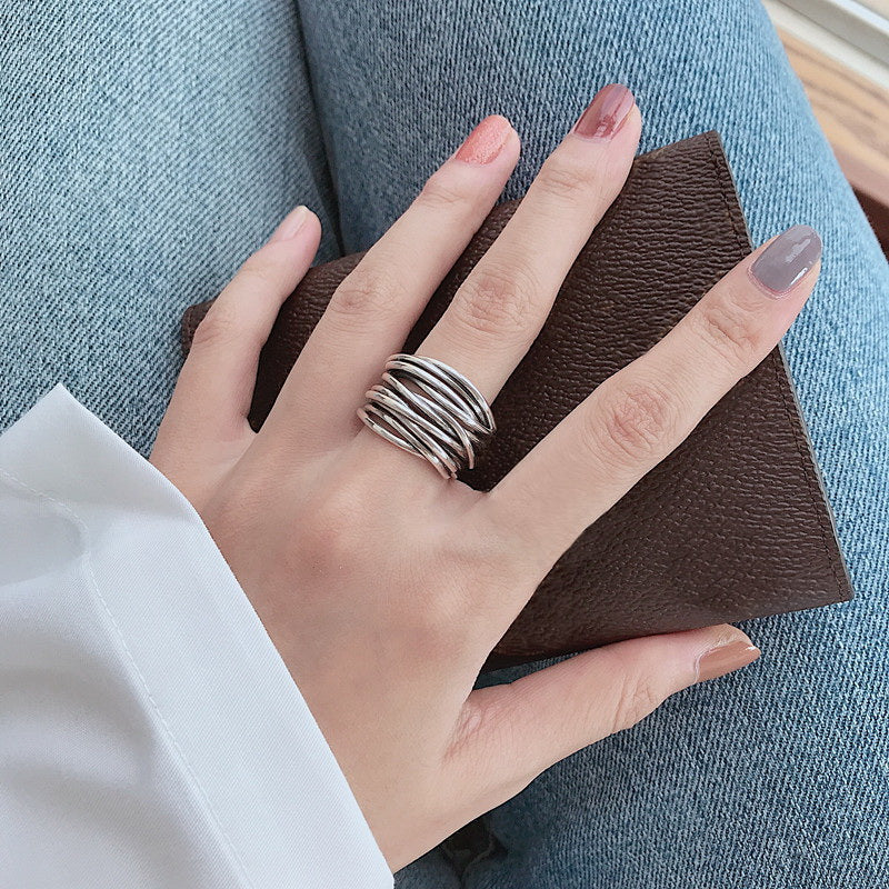 Anillo ajustable plateado en capas