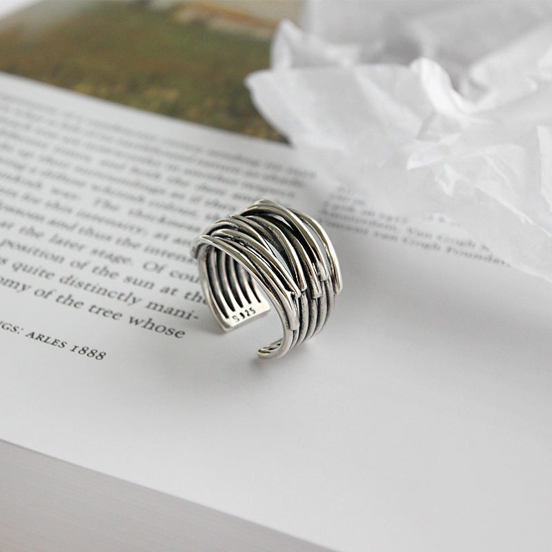 Anillo ajustable plateado en capas