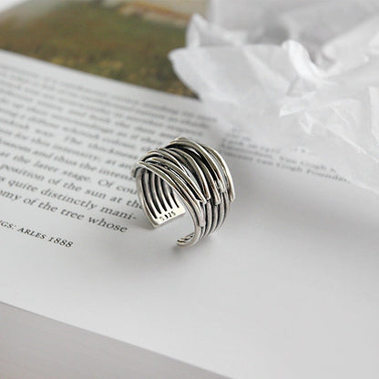 Anillo ajustable plateado en capas