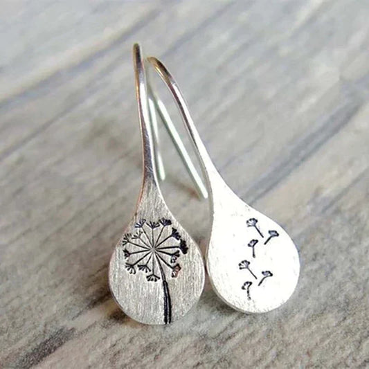 Pendientes de hoja de diente de león de plata finamente elaborados