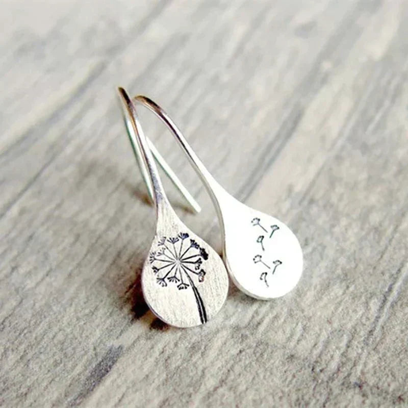 Pendientes de hoja de diente de león de plata finamente elaborados